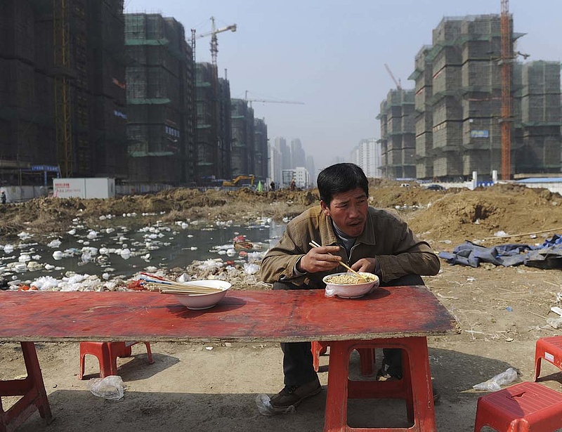 Elkezdtek dőlni a dominók Kínában, újabb ingatlancégek jelentettek csődöt